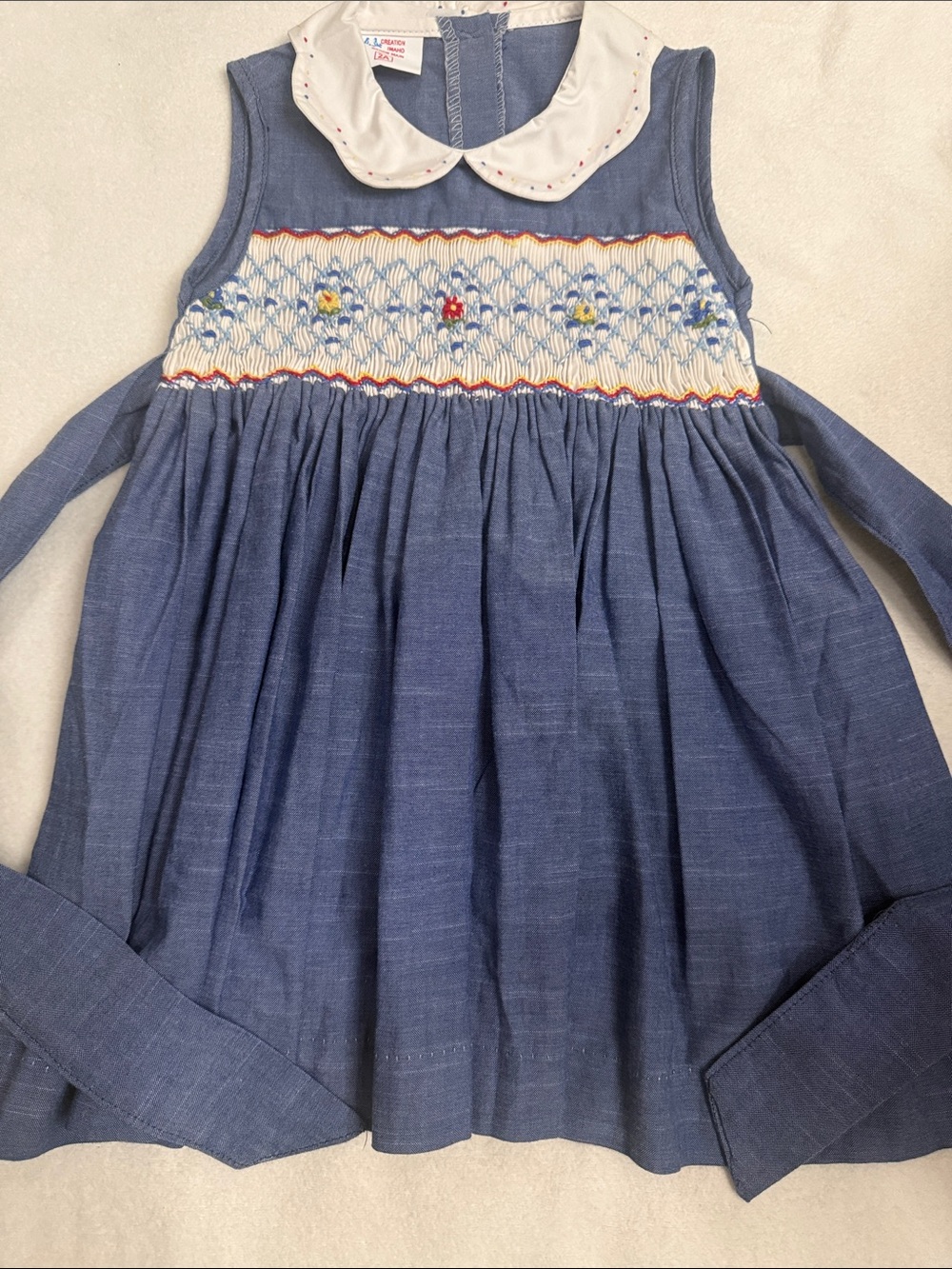 Smocked Blue Sleeveless Dress with Peter Pan Collar